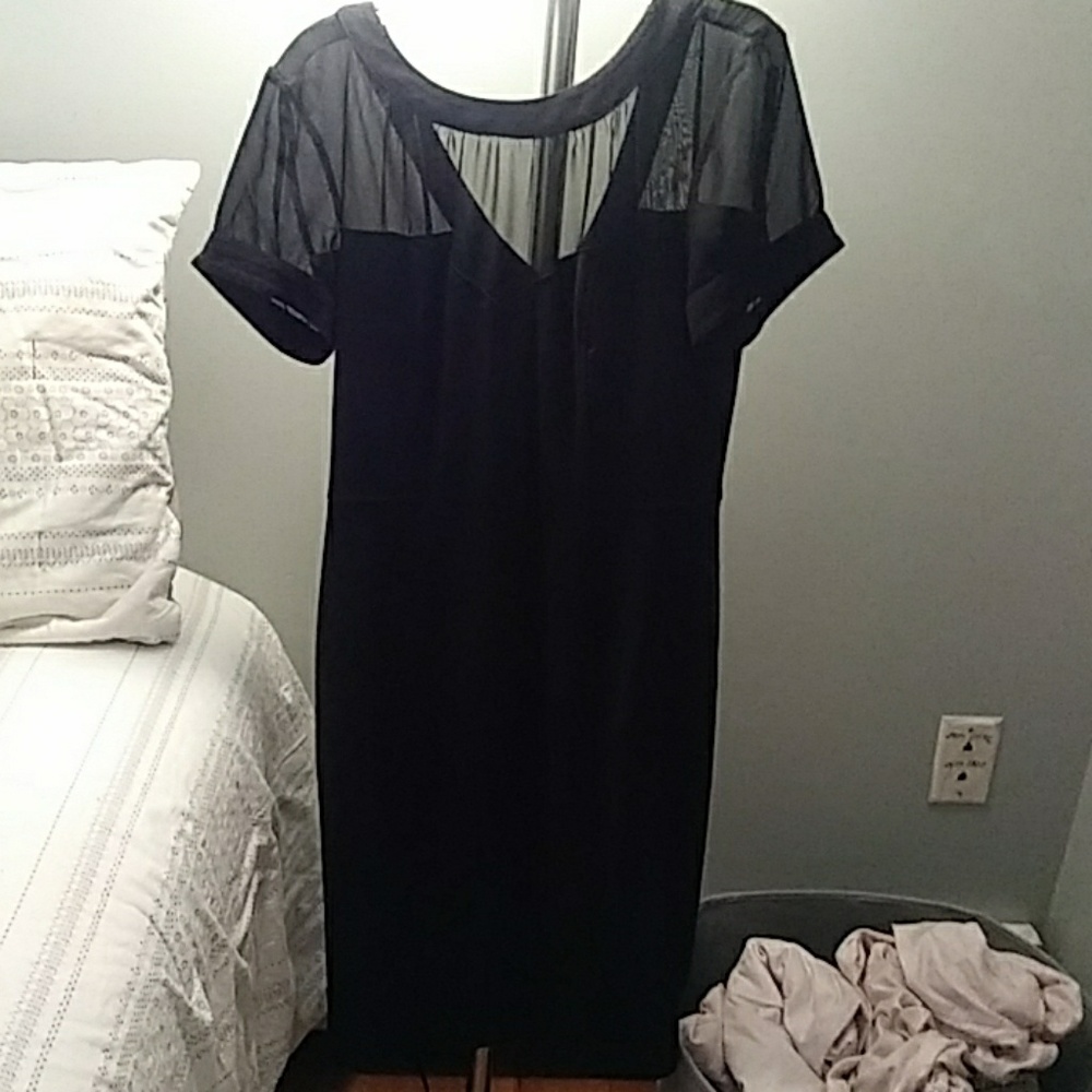 Classic black dress never worn but took tag off